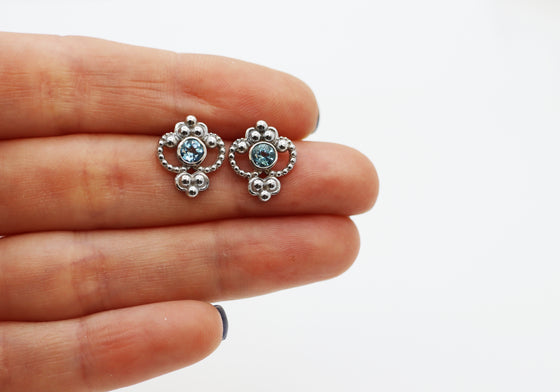 Boucles d'oreilles royales avec topazes