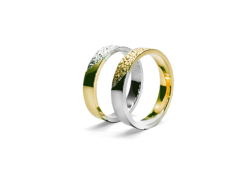 two white and yellow gold man rings between heaven and earth