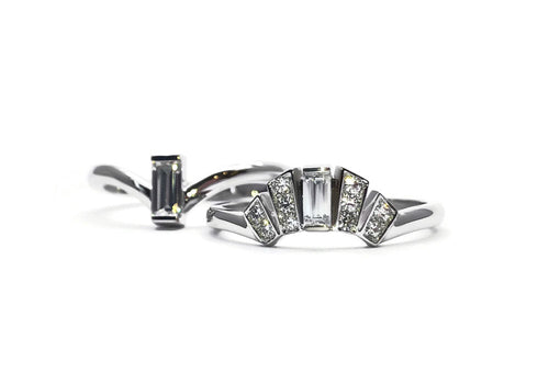 Two art deco style white gold rings with baguette diamonds