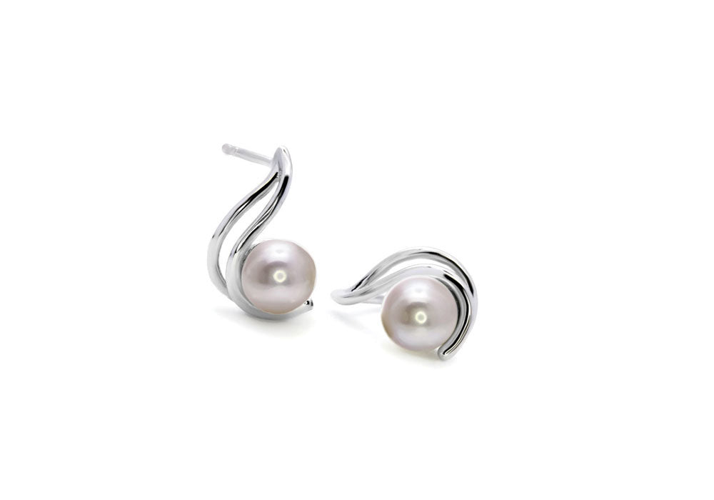 Sterling silver earrings with pink pearl on white background