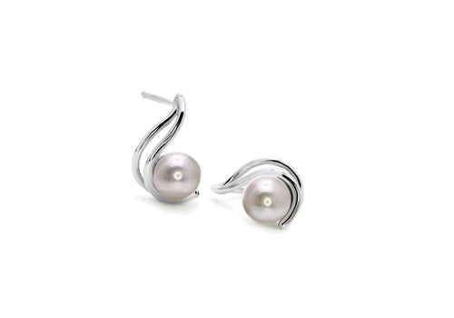 Earrings from the collection le berceau in white gold with pink pearls