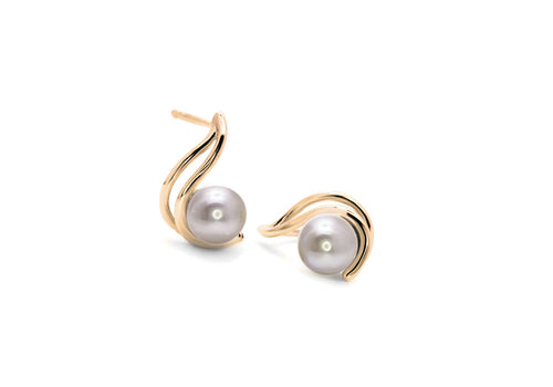 Two yellow gold earrings on white background with pink pearls