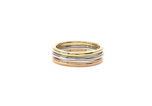 Three single rushes stacked. Yellow gold, white gold and rose gold.